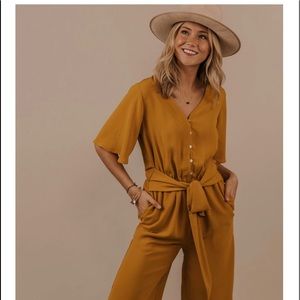 Cute mustard jumpsuit.